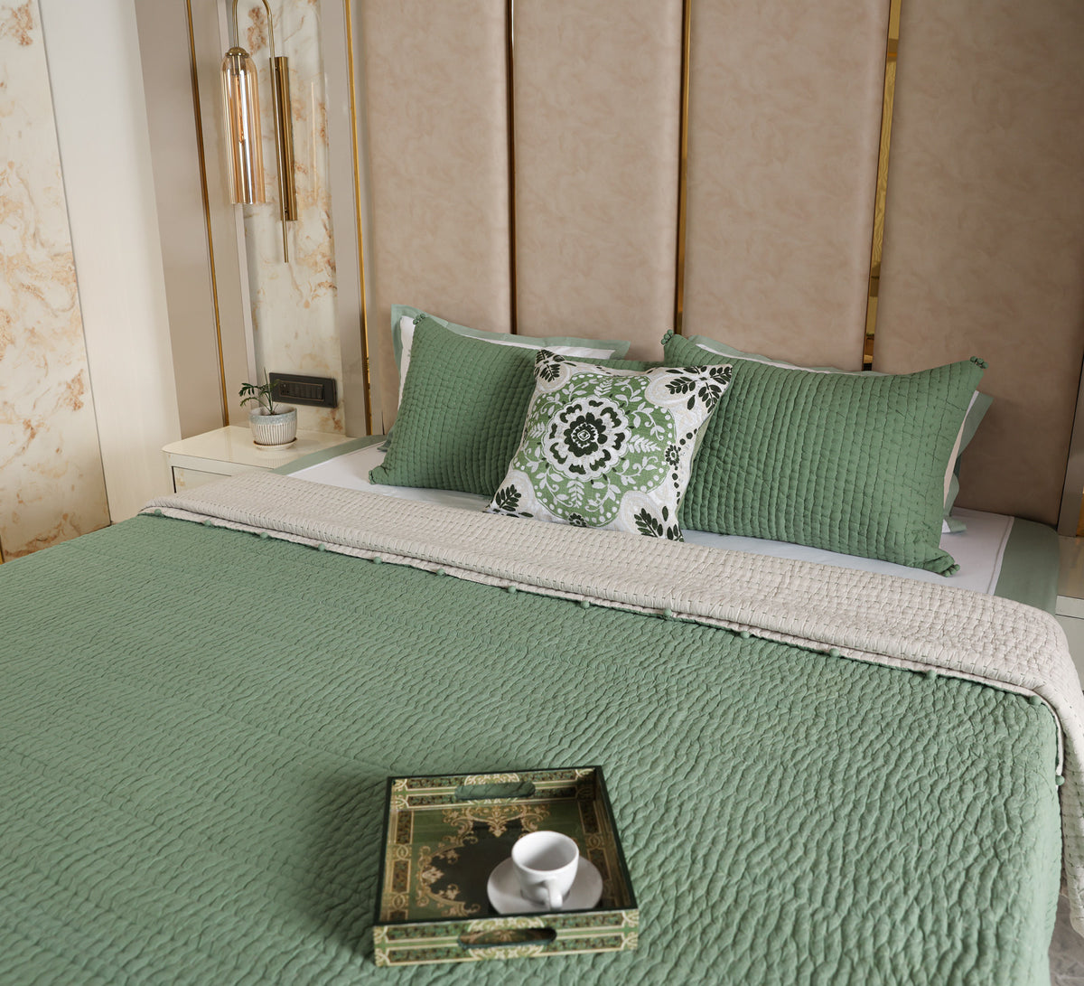 Hand quilted reversable double bed quilt with pompom