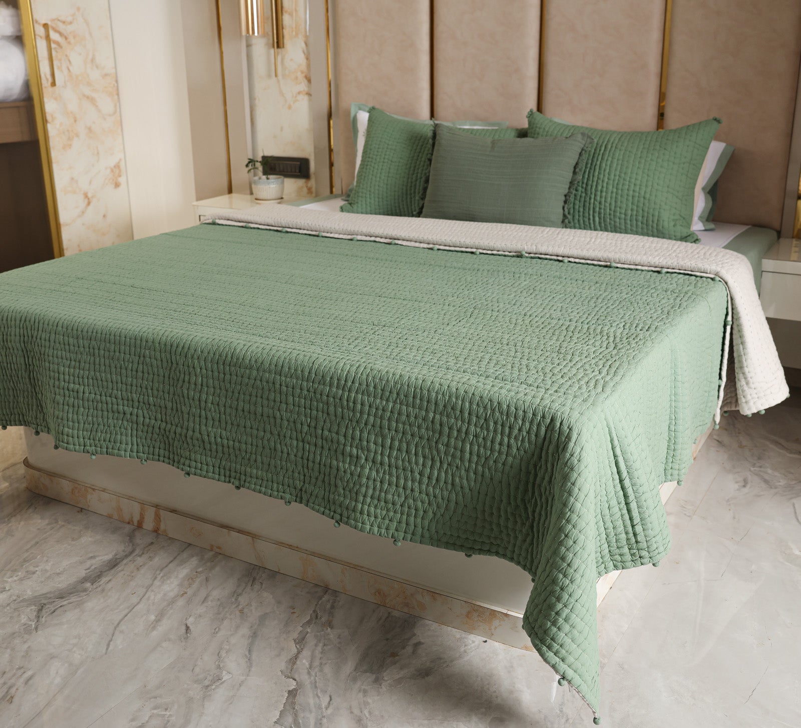 Hand quilted reversable double bed quilt with pompom