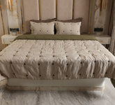 Flower tuck double bed quilt