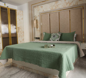 Hand quilted reversable double bed quilt with pompom