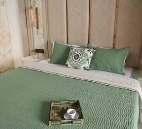 Hand quilted reversable double bed quilt with pompom