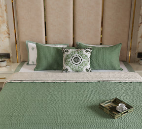 Hand quilted reversable double bed quilt with pompom